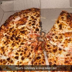 Domino's Pizza - This fat boy came and delivered my pizza and took a slice. Do not go here or order. Pizza is cold 20 minutes late.