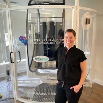 Better Brain & Body - Lead doctor, Dr. Alicia Brown standing in front of the GyroStim therapy device. - Chiropractors Near Me - Charlotte, North Carolina Better Brain & Body - Lead doctor, Dr. Alicia Brown standing in front of the GyroStim therapy device. - Chiropractors Near Me - Charlotte, North Carolina