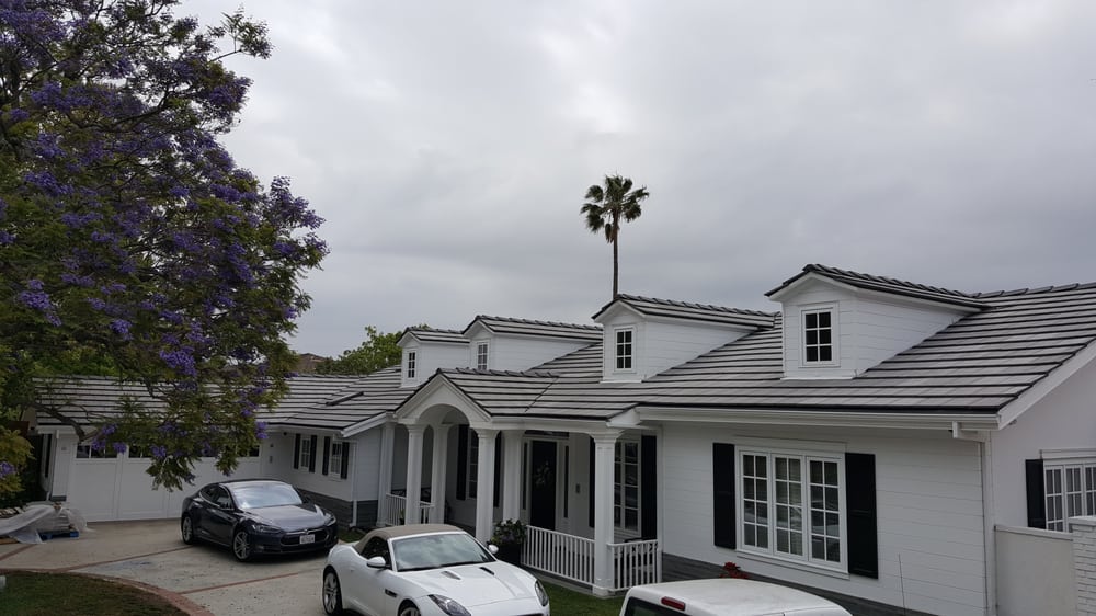 Slide of RC Roofing Co