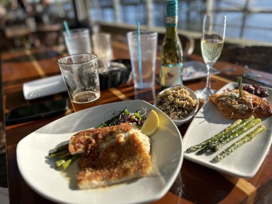 Photo of Caps On The Water - St Augustine, FL, US. Blackened Catch Mahi-Mahi and Honey Rosemary Salmon with Asparagus