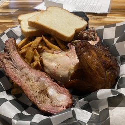 Dolans Bar B Q - Sampler Plate for $12.00! 1 Rib, smoked chicken, pulled pork, and fries
