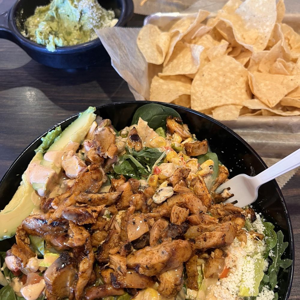 Torchy's Tacos - Guac & chips Amazing salad with grilled chicken - Tex-Mex Near Me - Fishers, Indiana Torchy's Tacos - Guac & chips Amazing salad with grilled chicken - Tex-Mex Near Me - Fishers, Indiana