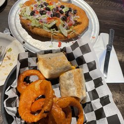 Roundhouse Brew Pub - Indian taco and pulled pork mac n cheese wrap with onion rings