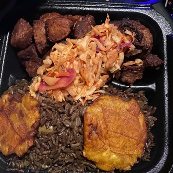 Ole Restaurant Lounge - a tray of food with meat, rice, and coleslaw - Hookah Bars Near Me - Stone Mountain, Georgia