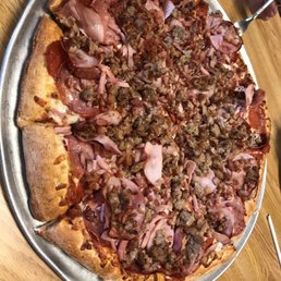 Our mega meat option pizza, more than what three people could wolf down. Our mega meat option pizza, more than what three people could wolf down.