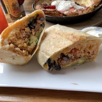 Milkweed - Burrito, Dutch baby pancake, fried chicken entrée dish. - New American Near Me - Boston, Massachusetts Milkweed - Burrito, Dutch baby pancake, fried chicken entrée dish. - New American Near Me - Boston, Massachusetts