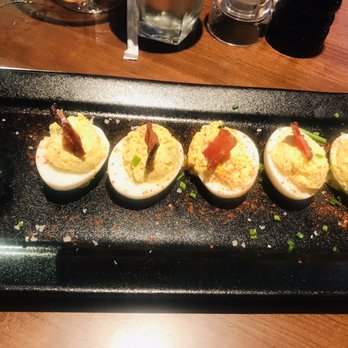 J. Alexander's - Deviled eggs minus one...lol - New American Near Me - Madison, Alabama