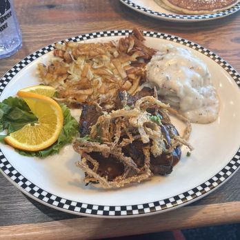 Black Bear Diner Tomball - Meatloaf with onion straws, mashed potatoes, hash browns, and orange slice - Diners Near Me - Tomball, Texas