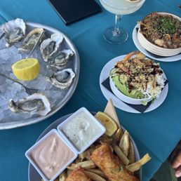 Mini fish and chips, oysters, shrimp fried rice, crunch roll bowl Mini fish and chips, oysters, shrimp fried rice, crunch roll bowl
