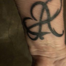 A - for my name  and the infinity sign.