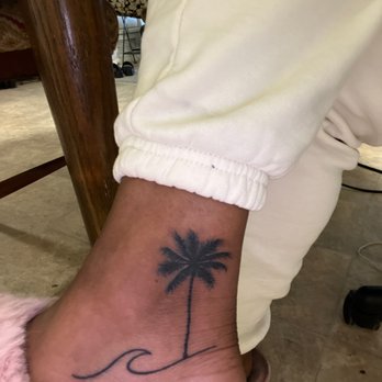 Coy Fish Tattoo - Palm tree w/ waves - Tattoo Near Me - Los Angeles, California