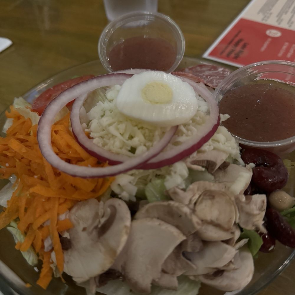 Excellent Mary's signature salad with Italian dressing Excellent Mary's signature salad with Italian dressing