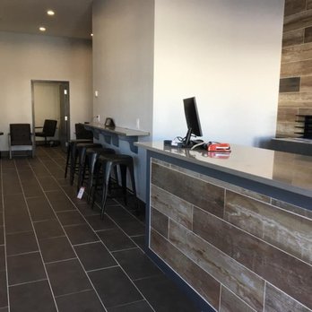 The ELITE Total Car Care - Elite Auto and Tires customer waiting area with color television, coffee and comfortable seating in a clean smkoe-free enviro... - Tires Near Me - Brandon, Florida The ELITE Total Car Care - Elite Auto and Tires customer waiting area with color television, coffee and comfortable seating in a clean smkoe-free enviro... - Tires Near Me - Brandon, Florida