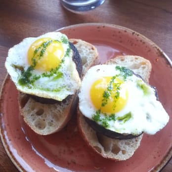Bar Raval - quail egg, blood sausage + baguette - Spanish Near Me - Toronto, Ontario Bar Raval - quail egg, blood sausage + baguette - Spanish Near Me - Toronto, Ontario
