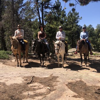 Bear Mountain Stables - Photo op midway through ride.  Trail guides Rachel and Liz positioned the horses and snapped a shot. - Horseback Riding Near Me - Conifer, Colorado