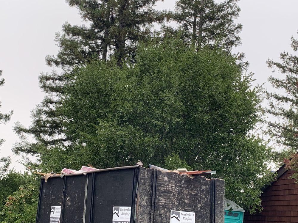 Slide of Trademark Roofing