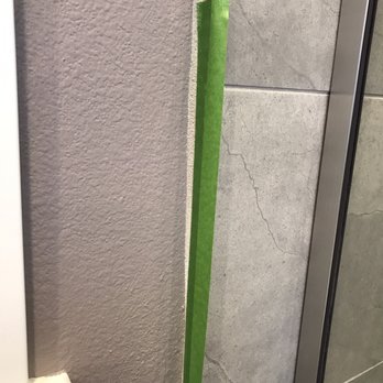 Ayers Contracting - Green tape to show how crooked it was - Door Sales/Installation Near Me Ayers Contracting - Green tape to show how crooked it was - Door Sales/Installation Near Me