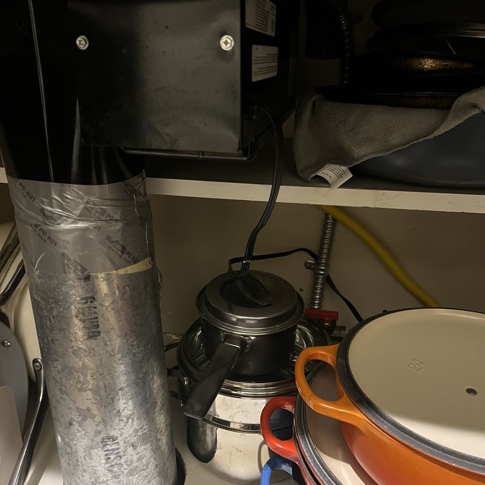 Under counter pic of finished gas line and ductwork, neatly out of the way so that we can still utilize the space Under counter pic of finished gas line and ductwork, neatly out of the way so that we can still utilize the space