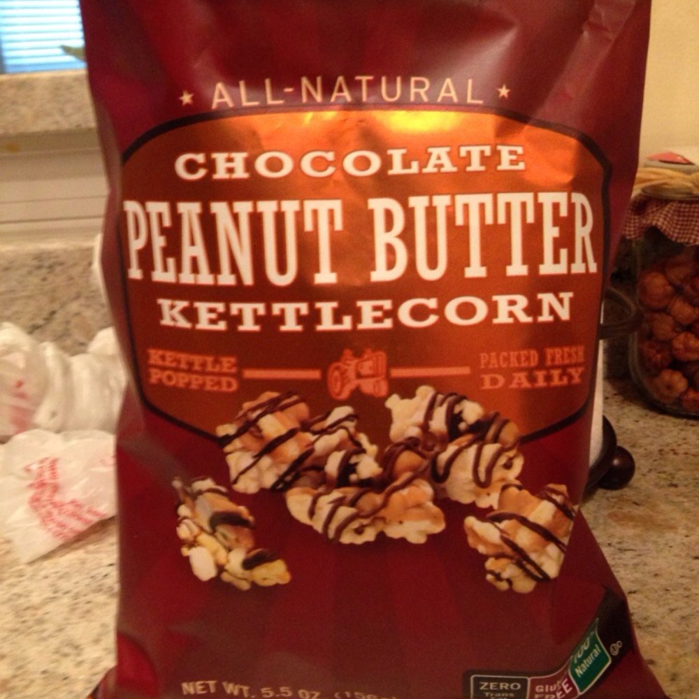 Why can I say, peanut butter with dark chocolate drizzle on kettlecorn...heaven!!! Why can I say, peanut butter with dark chocolate drizzle on kettlecorn...heaven!!!