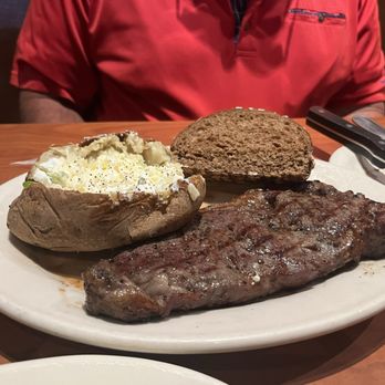 Black Angus Steakhouse - Sirloin steak with baked potato and rye bread - Steakhouses Near Me - Burbank, California