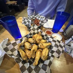 Big 10 Sports Bar & Grill - Naked traditional wings, spicy barbecue boneless wings