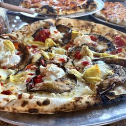 Carciofe D'Amore: fire roasted artichokes, grilled eggplant, picante peppers with provolone-mozzarella and ricotta clouds Carciofe D'Amore: fire roasted artichokes, grilled eggplant, picante peppers with provolone-mozzarella and ricotta clouds