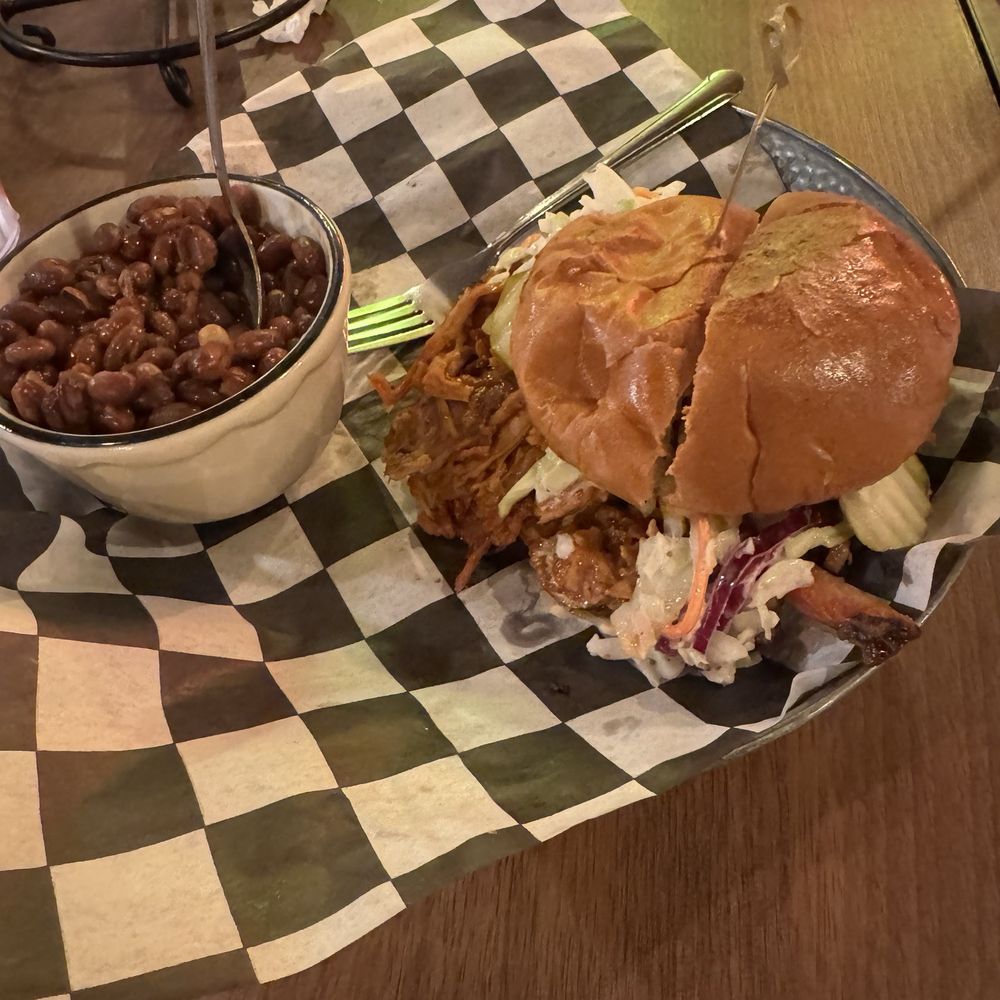 Jasper's Barbeque - Pulled pork sandwich with beans (wouldn't get the beans again, they don't taste like traditional baked beans) - Barbeque Near Me - Big Bear Lake, California Jasper's Barbeque - Pulled pork sandwich with beans (wouldn't get the beans again, they don't taste like traditional baked beans) - Barbeque Near Me - Big Bear Lake, California