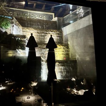 Dakota’s Steakhouse - Dining room looks out to a waterfall - Steakhouses Near Me - Dallas, Texas