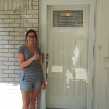 JT Doors - This customer from Dearborn was so happy with her new doors. - Door Sales/Installation Near Me