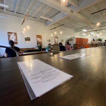 Luppoleto Brewing - a long table with a menu on it - Breweries Near Me - Windsor Locks, Connecticut