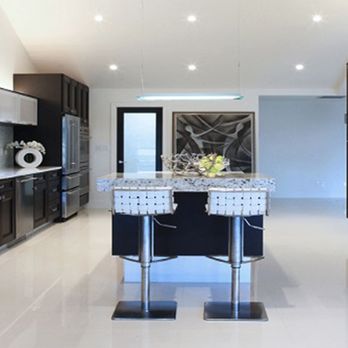 Boca Kitchens & Baths - a modern kitchen with black cabinets - General Contractors Near Me - Boca Raton, Florida Boca Kitchens & Baths - a modern kitchen with black cabinets - General Contractors Near Me - Boca Raton, Florida