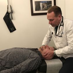 DBC Natural Holistic Health Care - Dr. den Boer chiropractic adjustment