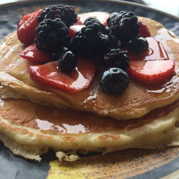 Pilot Light - Pancakes n Berries. Eggs and sausage in the background. - Breakfast & Brunch Near Me - Half Moon Bay, California