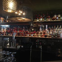 Playbook Sports Bar - The bar has a endless selection and the bar stools are so comfy you can stay forever!!