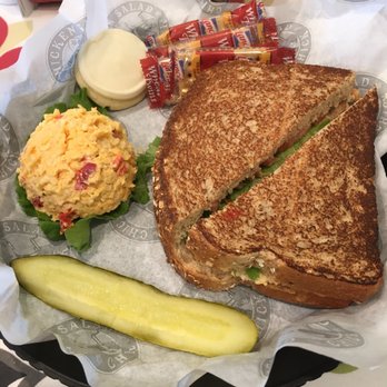 Chicken Salad Chick - The chick. Kickin Kay Lynne on toasted wheat with lettuce and tomato. Pimento cheese as a side with a pickle spear and cookie - Southern Near Me - Birmingham, Alabama Chicken Salad Chick - The chick. Kickin Kay Lynne on toasted wheat with lettuce and tomato. Pimento cheese as a side with a pickle spear and cookie - Southern Near Me - Birmingham, Alabama