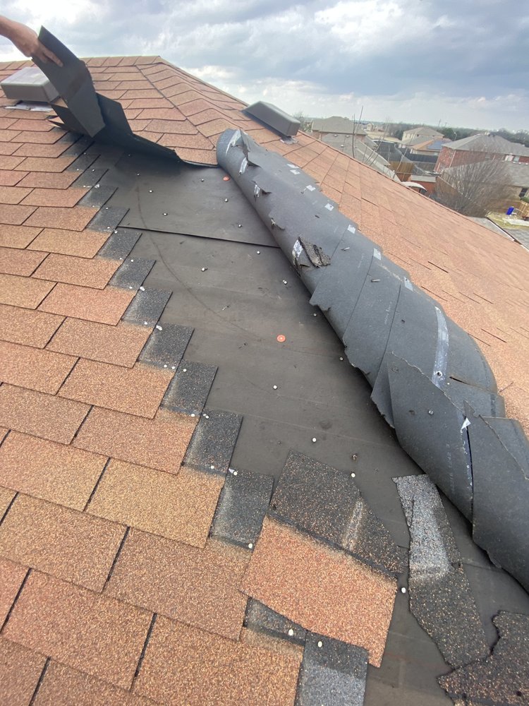 Slide of Holguin Roofing & Exteriors