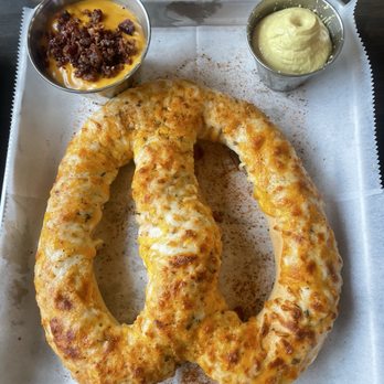 Wetlands Brewery - Delicious Buffalo stuffed chicken pretzel! Added the side of beer cheese! Comes with the Dijon mustard - Breweries Near Me - Van Etten, New York Wetlands Brewery - Delicious Buffalo stuffed chicken pretzel! Added the side of beer cheese! Comes with the Dijon mustard - Breweries Near Me - Van Etten, New York