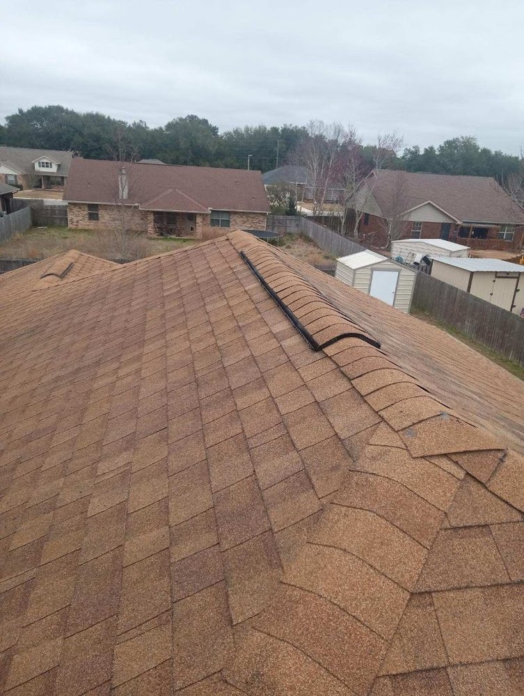 Slide of H.E. Roberts Roofing