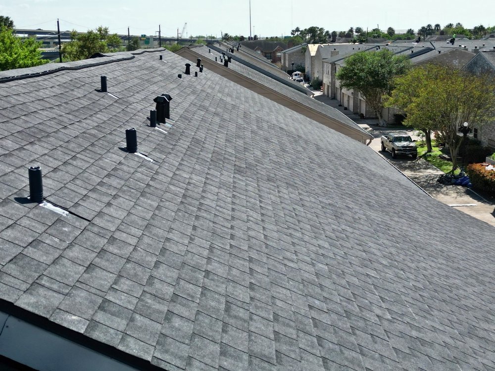 Slide of Whatley Roofing