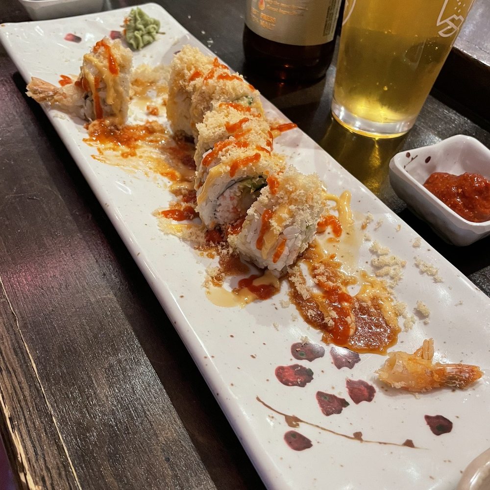 Sushi Motto - Lunch crunch roll with added chili sauce (already started, sorry!) - Japanese Near Me - Anchorage, Alaska Sushi Motto - Lunch crunch roll with added chili sauce (already started, sorry!) - Japanese Near Me - Anchorage, Alaska