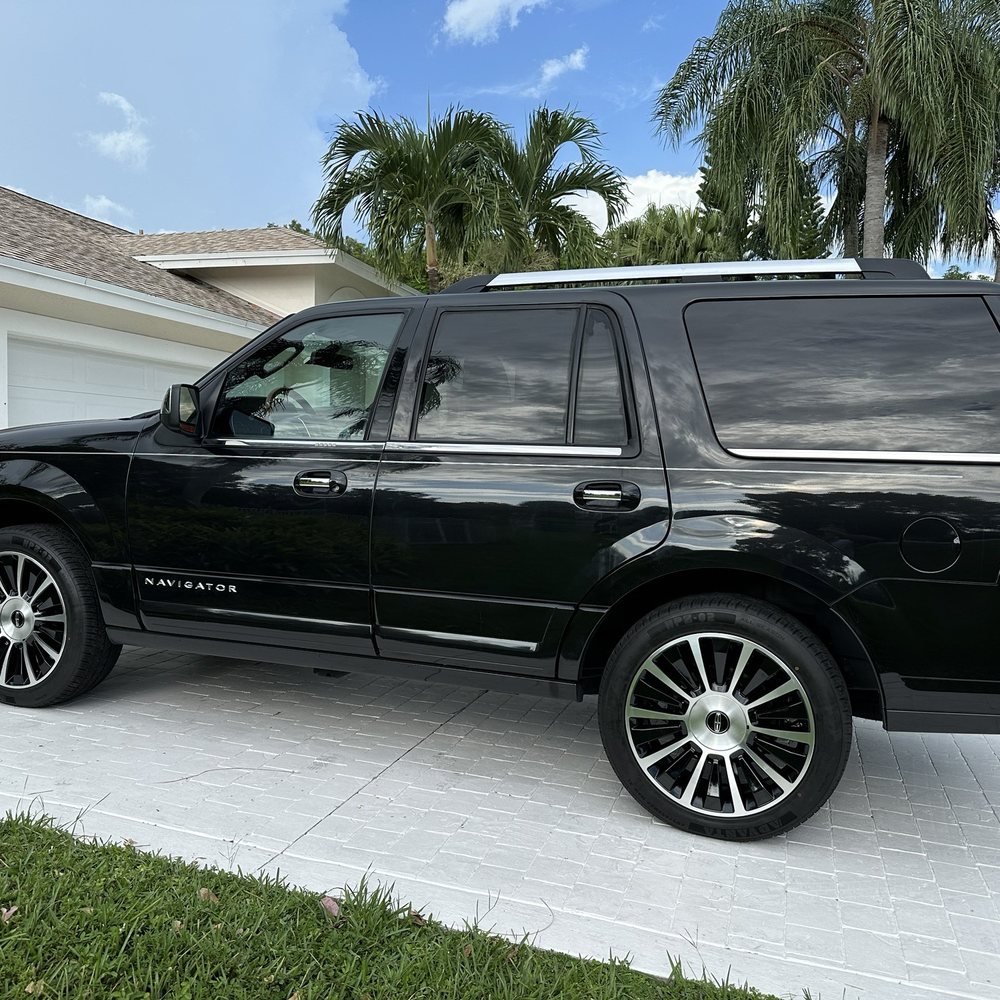 Anthonys Mobile Tire - My 2015 Lincoln Navigator with custom wheels by Anthony powdered coated in polished aluminum with tuxedo black pockets. - Tires Near Me