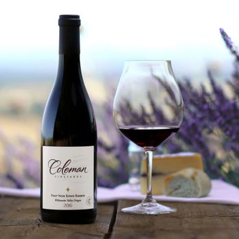 Coleman Vineyard - a glass of wine and a bottle of wine - Wine Tasting Room Near Me - McMinnville, Oregon