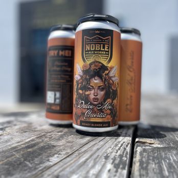 Noble Ale Works - two cans of beer on a wooden table - Breweries Near Me - Anaheim, California Noble Ale Works - two cans of beer on a wooden table - Breweries Near Me - Anaheim, California