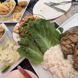 Barbarella Restaurant & Lounge - Brit fish be chips, spinach dip, grilled pork set with spicy papaya salad.