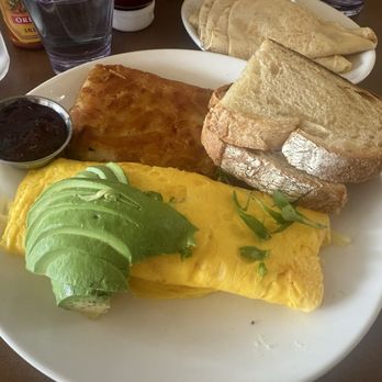 Poached Kitchen - Create your own omelette (cheese and avocado) with hash browns and sourdough toast with strawberry jam - Breakfast & Brunch Near Me - Whittier, California Poached Kitchen - Create your own omelette (cheese and avocado) with hash browns and sourdough toast with strawberry jam - Breakfast & Brunch Near Me - Whittier, California