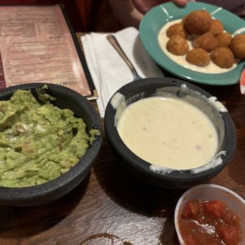 Salena's Mexican Restaurant - Queso and GUACAMOLE (rice balls in the background) - Mexican Near Me - Rochester, New York Salena's Mexican Restaurant - Queso and GUACAMOLE (rice balls in the background) - Mexican Near Me - Rochester, New York
