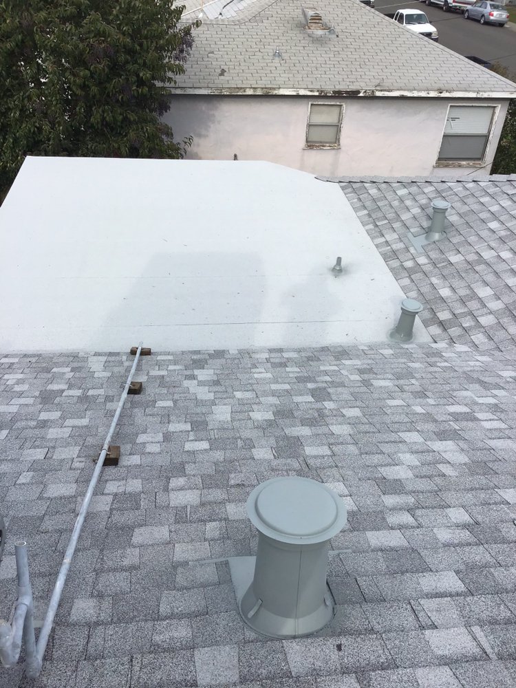 Slide of Rodriguez Roofing Pros