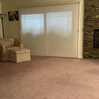 Window Coverings By Design - This is a 10' patio LEVOLOR blind.It opens right to left and the opposite way. Light filtering into a large living room. - Shades & Blinds Near Me