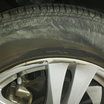 Hi-Tech CARSTAR - Close-up of damaged passenger side front tire/rim on my Santa Fe. - Body Shops Near Me - Spanaway, Washington
