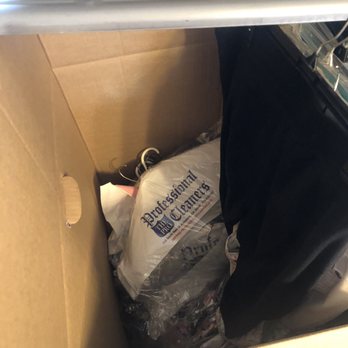 Georgia Pack and Load Moving & Storage - hanging clothes dropped and stuffed into a wardrobe box with hanging clothes.. - Movers Near Me - Suwanee, Georgia